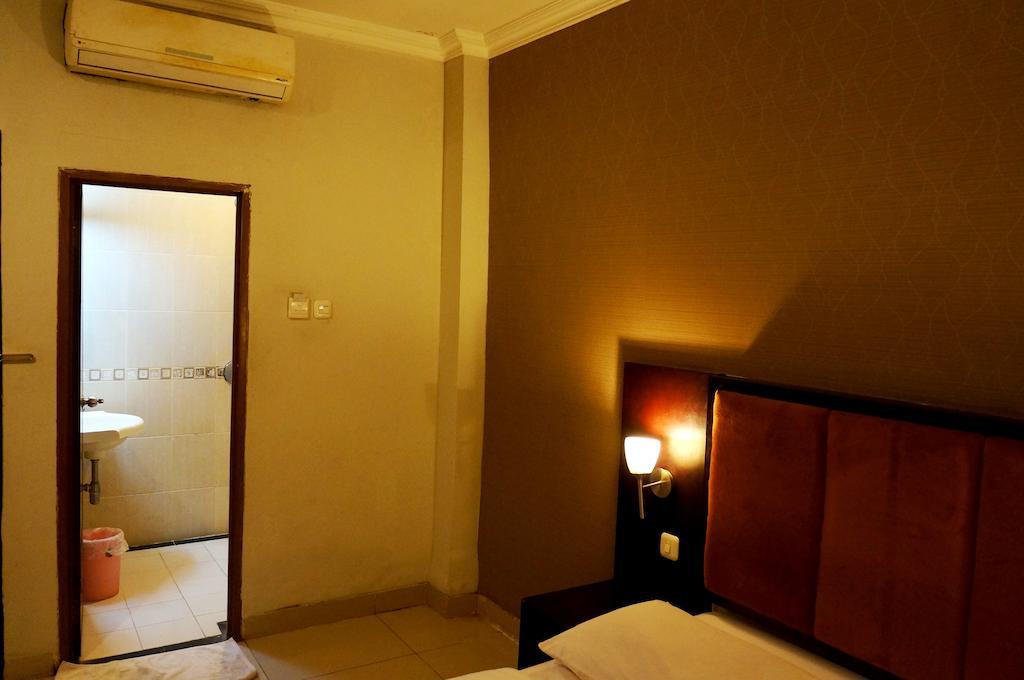 Feodora Airport Hotel Palimbão Quarto foto